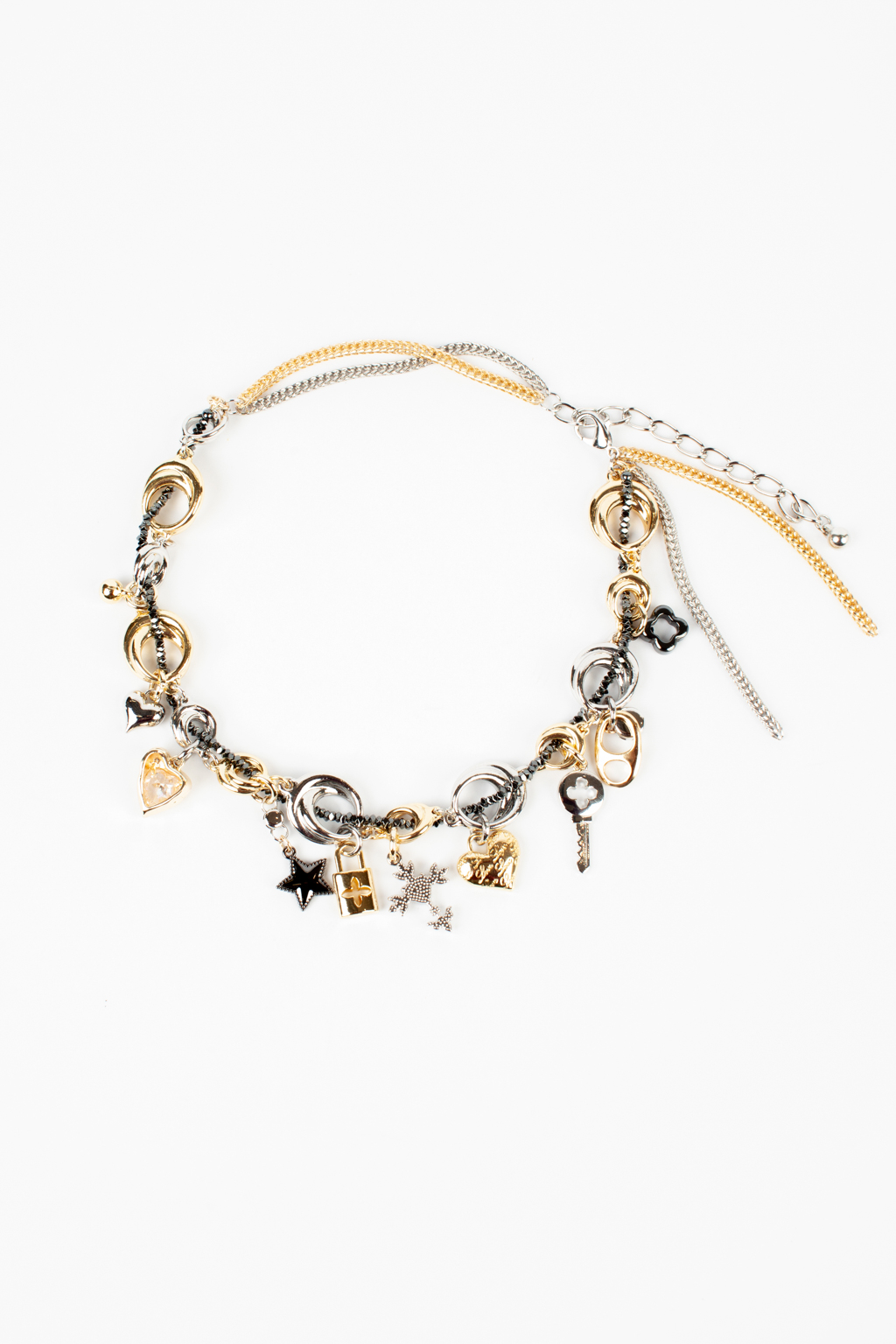Оригинальное колье на основе металлической цепи с набором необычных подвесок в виде замка, креста, ключа, сердца и звезды. Фурнитура выполнена из гипоаллергенного сплава со стойким гальваническим покрытием золотом и серебром. Длина составляет 45 - 54 см, а вес – 109 гр.