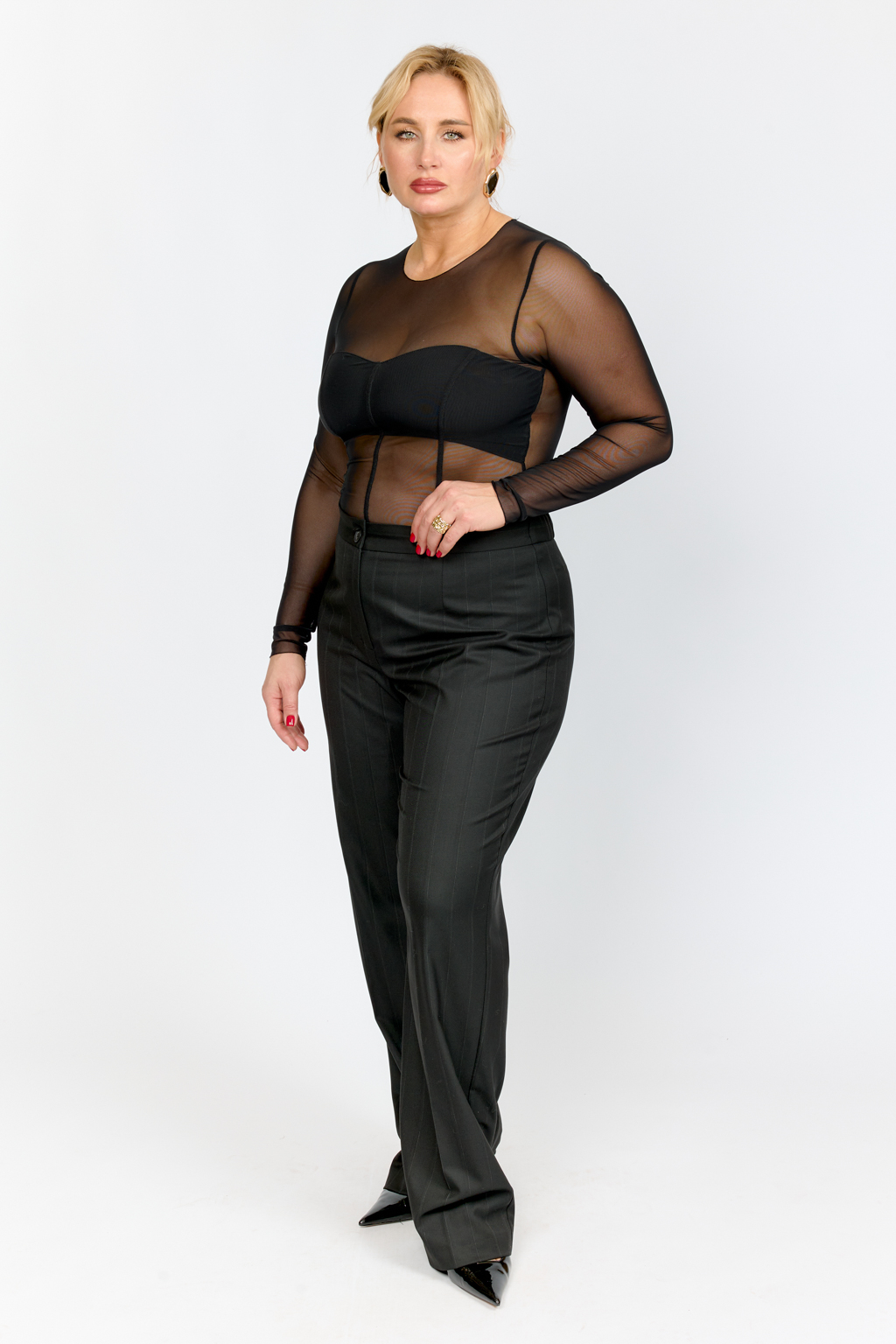 Боди из сетки приталенного силуэта с лифом с плотной ткани. Рукав полной длины.