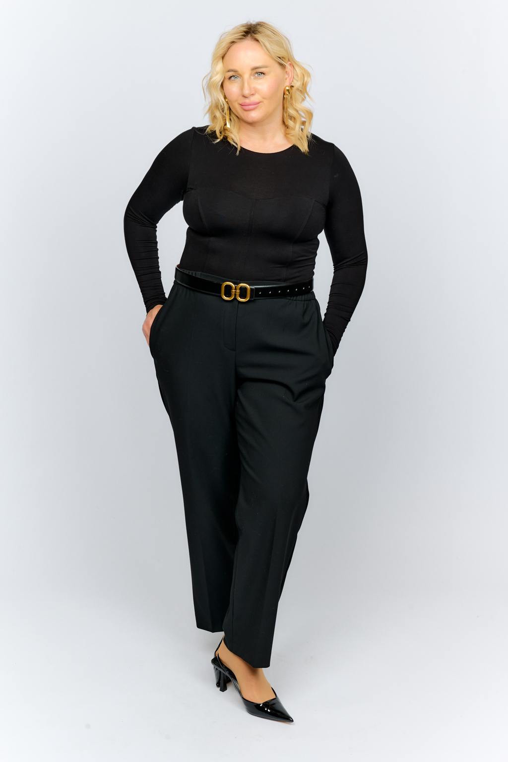 Боди из бамбука приталенного силуэта с рельефами на полочке. Рукав полной длины.