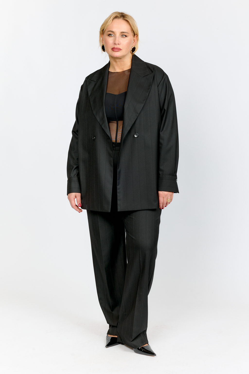 Боди из сетки приталенного силуэта с лифом с плотной ткани. Рукав полной длины.