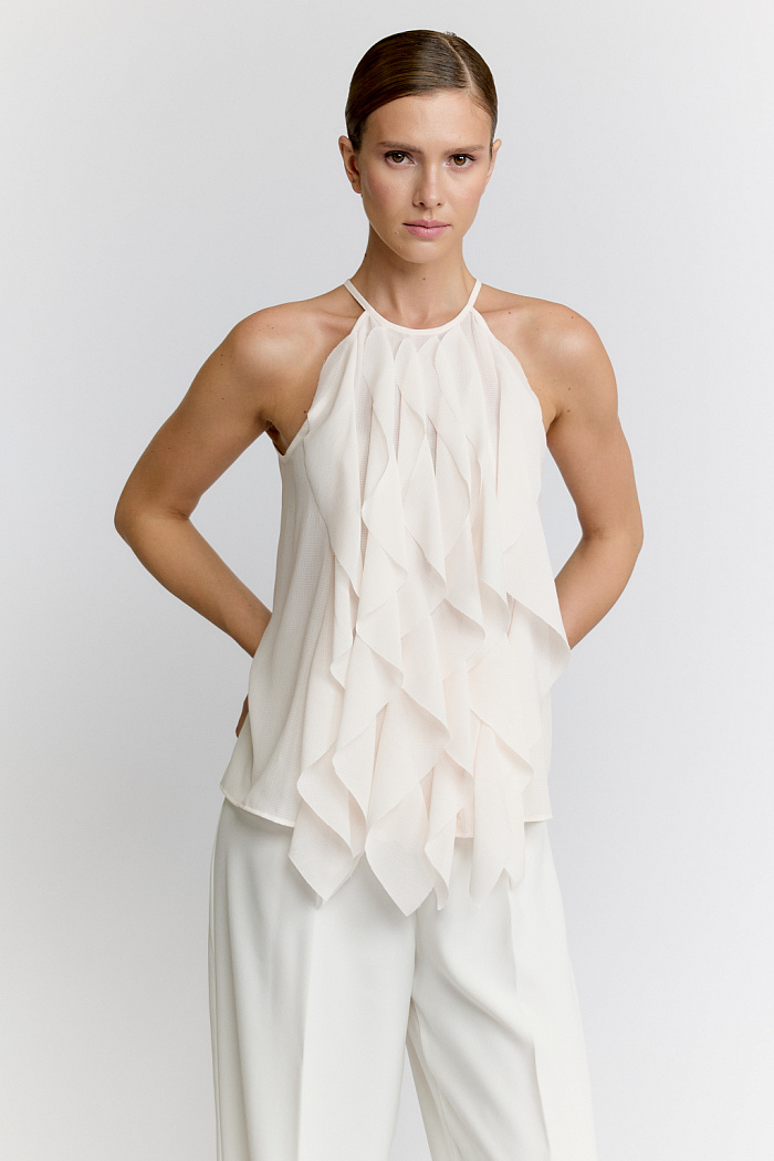 Топ с воланами по полочке.