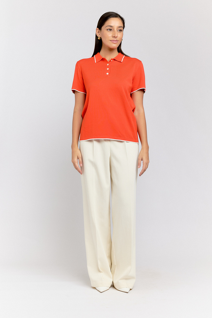 Поло вязаное в полоску с коротким рукавом. Планка на пуговицах.