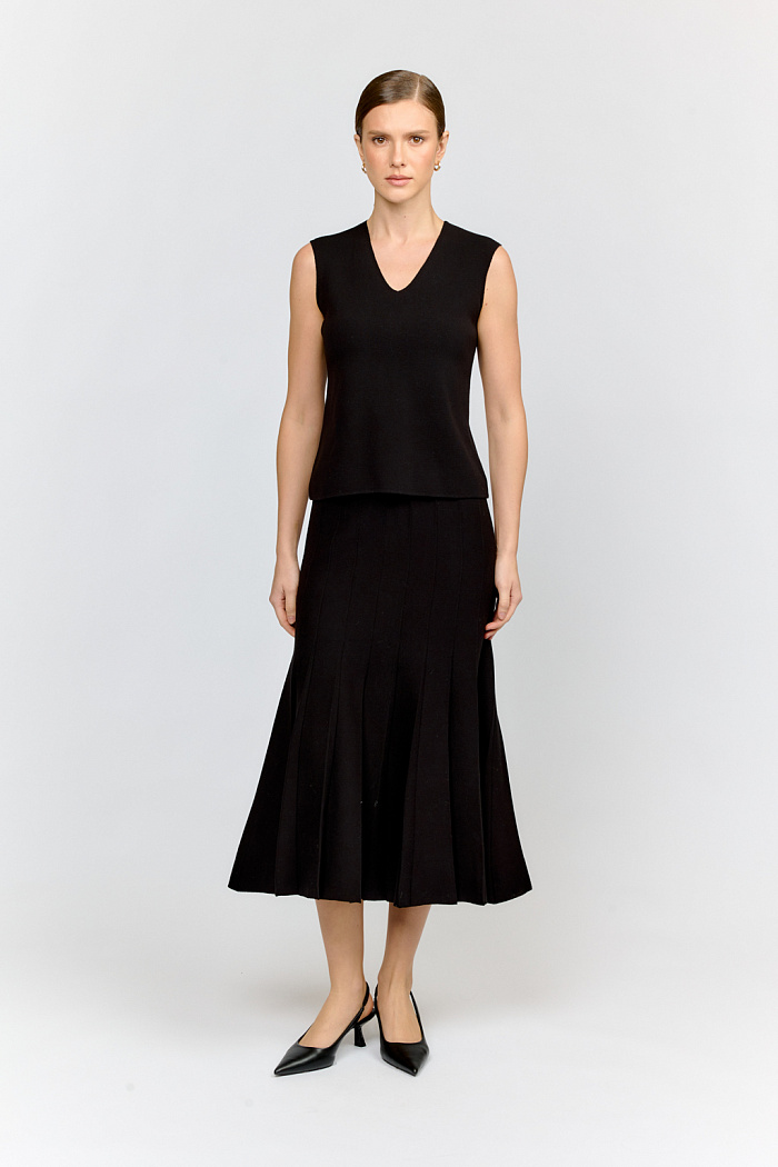 Юбка длиной миди со складками