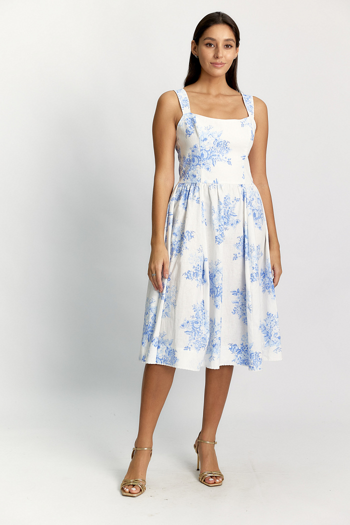 Платье с пышной юбкой длины миди. Оригинальная обработка специальными нитками.