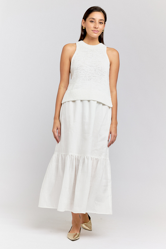 Юбка на резинке длины миди с ярусом по низу.