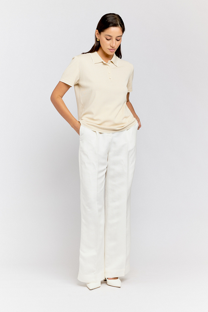 Поло вязаное в полоску с коротким рукавом. Планка на пуговицах.