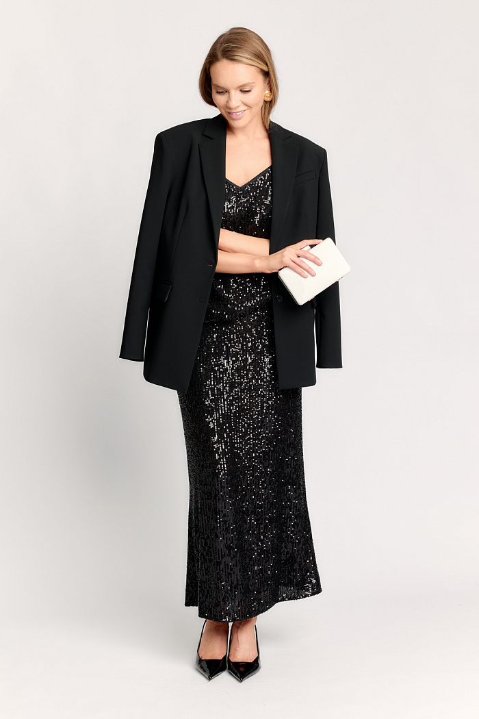 Блуза без рукавов с  V-образным вырезом свободного кроя. Бретели из декоративной ткани.