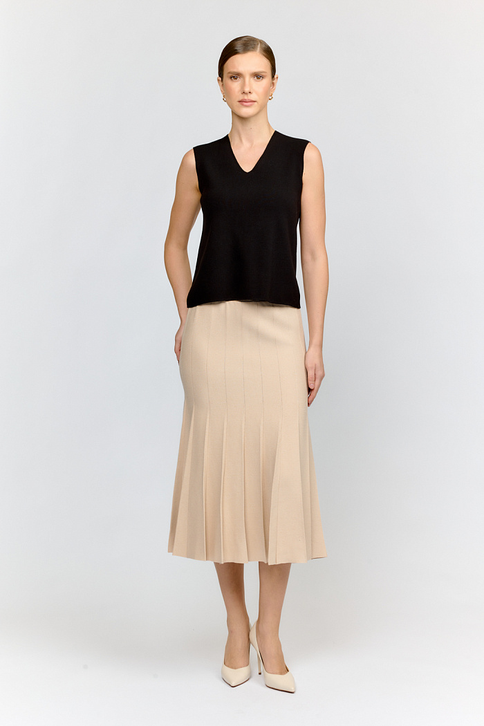 Юбка длиной миди со складками