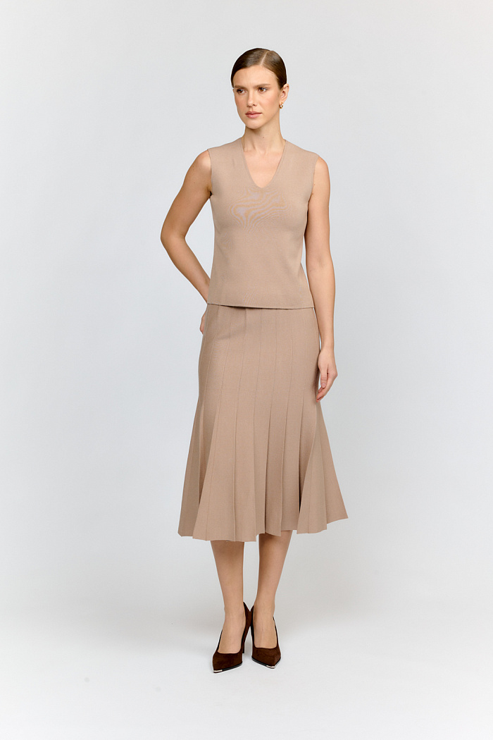 Юбка длиной миди со складками