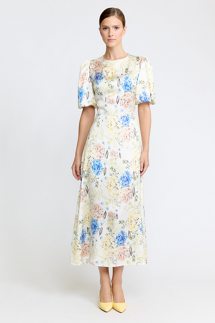 Платье длиной миди с отрезной трапециевидной юбкой и пышными  рукавами со сборкой.