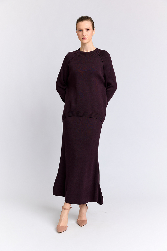 Юбка силуэта русалка длиной миди.