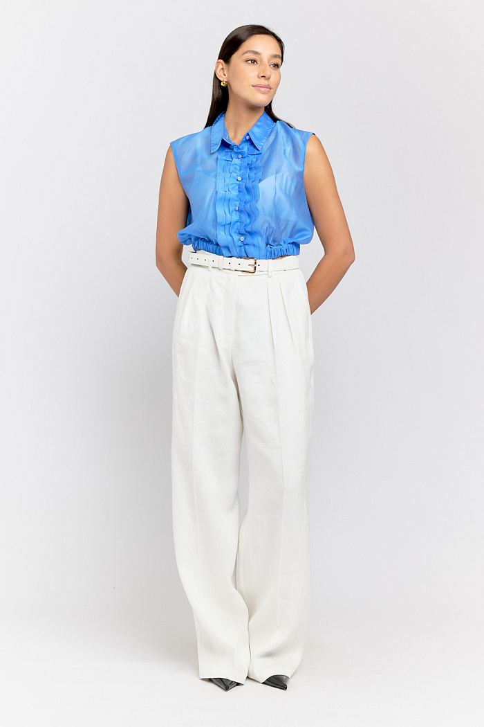 Блуза укороченная с декоративной широкой рюшей на полочке. Низ на резинке.