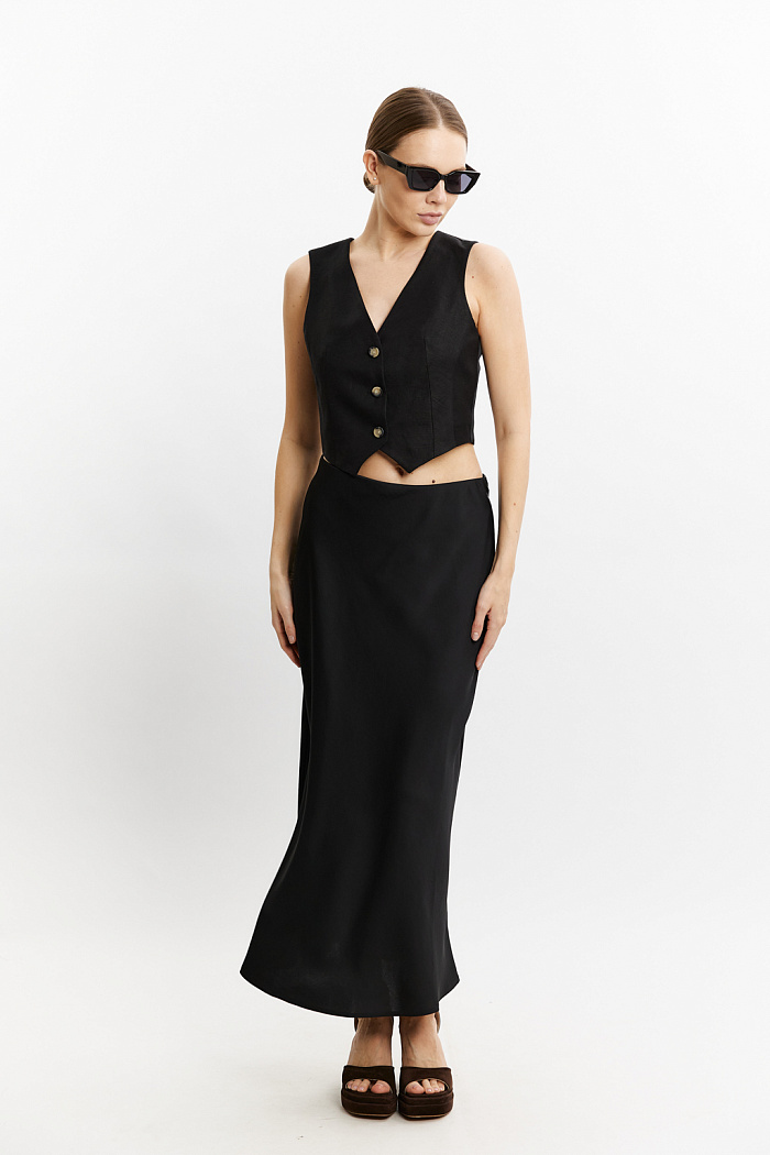 Юбка на талии на резинке полуприлигающего силуэта длины макси.